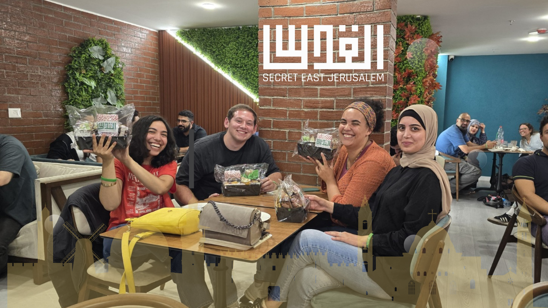 A photograph of the winners of Trivia Night in Shuafat at the Saray Bakery Cafe